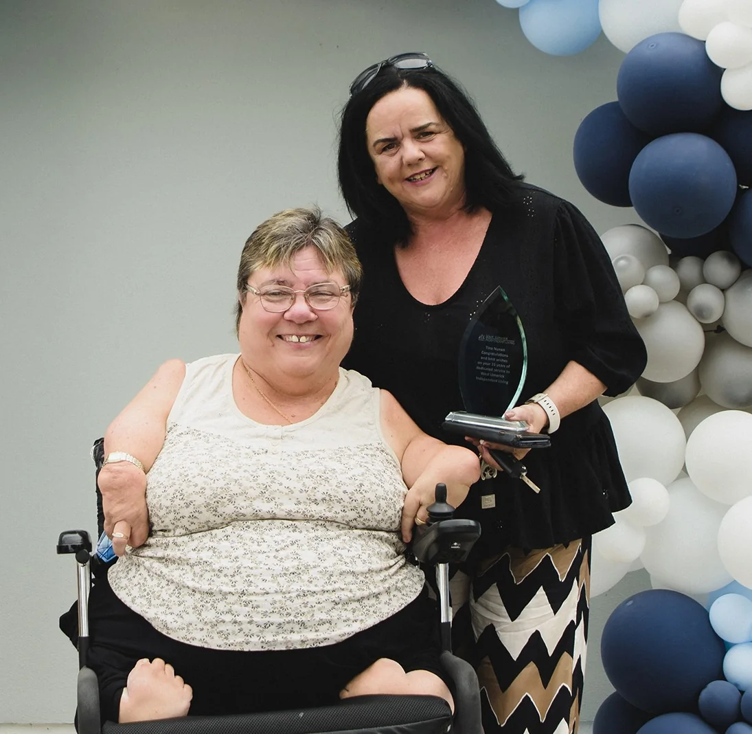 Personal Assistant Tina Noonan with service user and former Board member Leigh Gath in 2023
